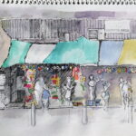 Pencil, pen and watercolour sketch by Ann Williams of shops in seaside town of Sai Kung, Hong Kong